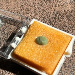 Jade, loose stone , one side flat, and the other side has a small round quality